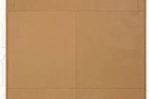Tan leather prayer mat with arch design