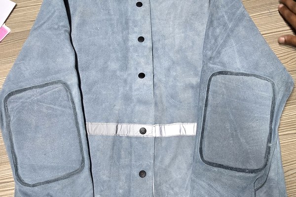 Split leather welding jacket with reinforced panels and reflective strips
